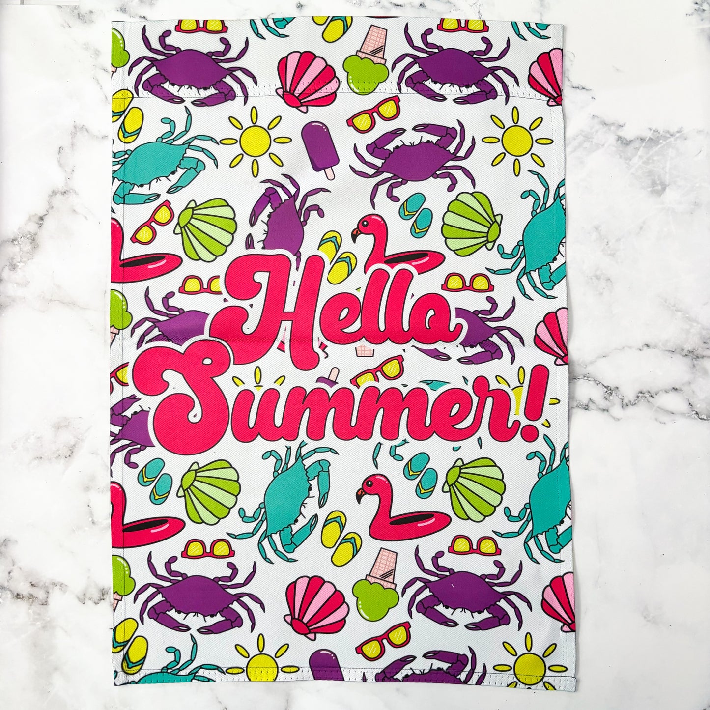 A bright and color garden flag that reads Hello Summer. Filled with crabs seashells, flip flops, and other summer items.