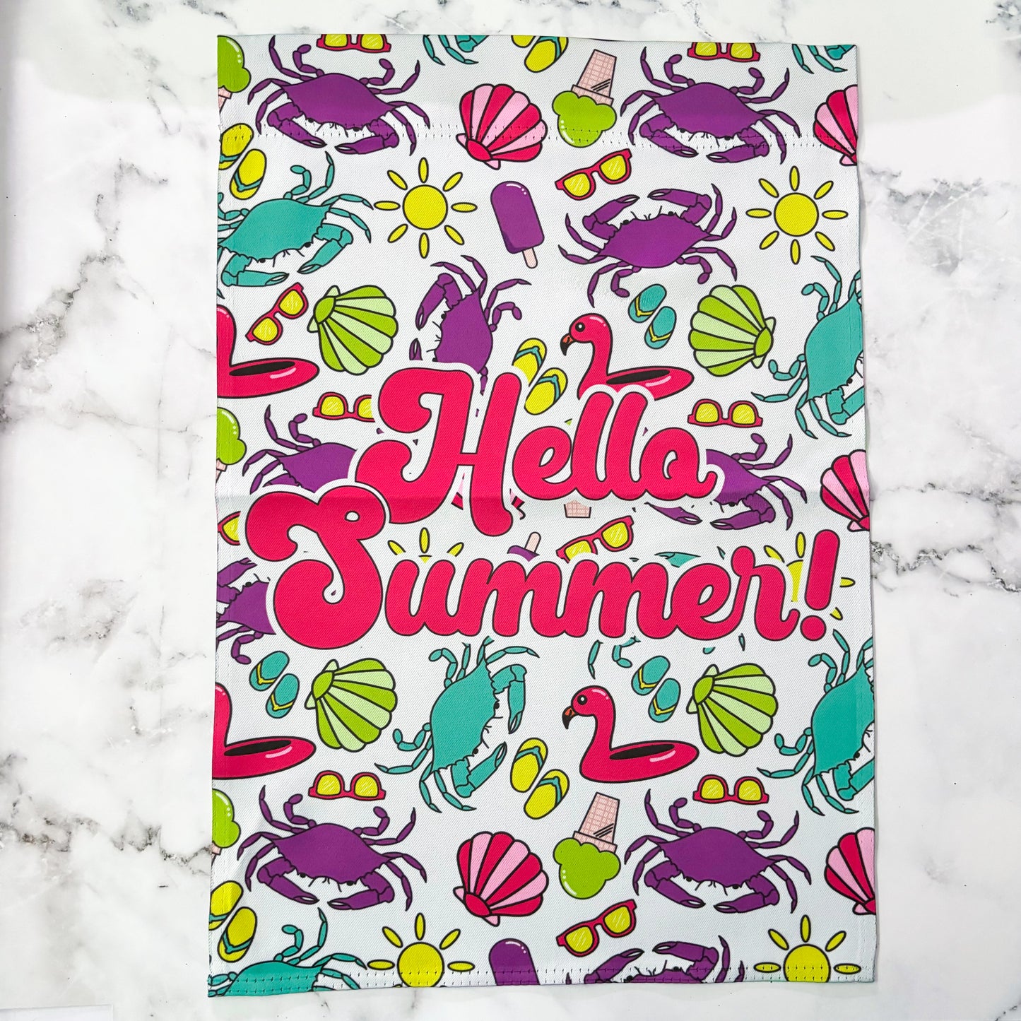 A bright and color garden flag that reads Hello Summer. Filled with crabs seashells, flip flops, and other summer items.